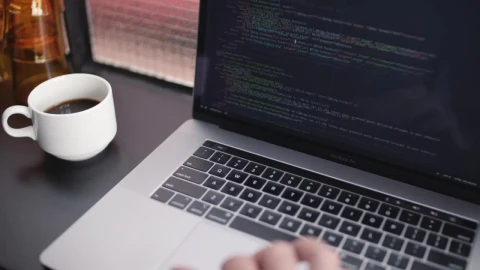 Free Video Stock Software Developer Working While Drinks Coffee Live Wallpaper - Free Live Wallpaper