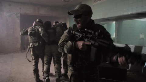 Free Video Stock Soldiers Carrying A Wounded Man Through A Building Live Wallpaper - Free Live Wallpaper