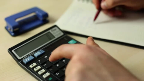 Free Video Stock Solving Accounts In A Notebook With A Calculator Live Wallpaper - Free Live Wallpaper