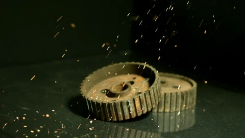 Free Video Stock Sparks Falling Into Industrial Gears Live Wallpaper - Free Live Wallpaper