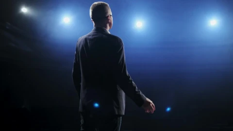 Free Video Stock Speaker In Suit Speaks To His Audience On Stage Live Wallpaper - Free Live Wallpaper
