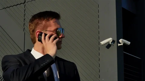 Free Video Stock Special Agent Talking On The Phone Live Wallpaper - Free Live Wallpaper
