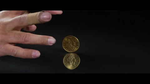 Free Video Stock Spinning Coin On A Reflective Surface Live Wallpaper - Free Live Wallpaper