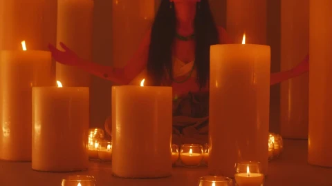Free Video Stock Spiritual Woman Meditating Surrounded By Many Candles Live Wallpaper - Free Live Wallpaper
