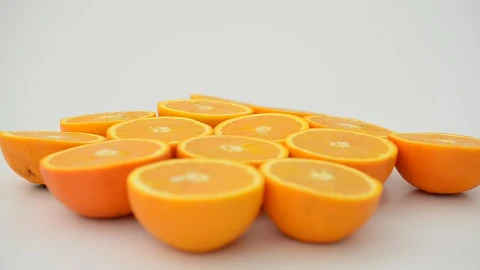 Free Video Stock Split Oranges Rotating On A White Background Live Wallpaper - Free Live Wallpaper