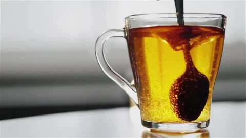 Free Video Stock Spoon Stirring Sugar In Clear Glass Tea Cup Live Wallpaper - Free Live Wallpaper