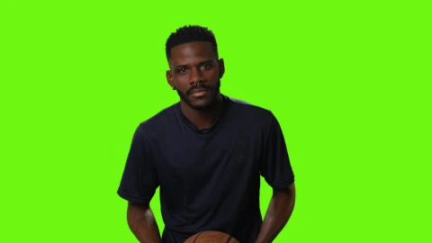 Free Video Stock Sportsman With A Basketball On A Green Background Live Wallpaper - Free Live Wallpaper