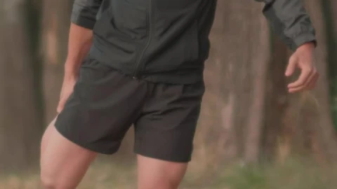 Free Video Stock Sporty Man Stretching In The Middle Of A Forest Live Wallpaper - Free Live Wallpaper