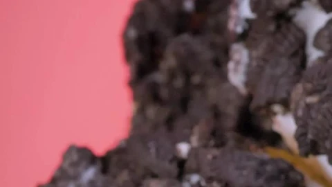 Free Video Stock Stacking Donuts With Cookie Pieces On A Pink Background Live Wallpaper - Free Live Wallpaper