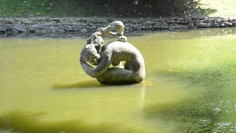 Free Video Stock Statue Sitting In A Pond Live Wallpaper - Free Live Wallpaper