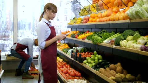 Free Video Stock Store Worker Using A Tablet Live Wallpaper - Free Live Wallpaper