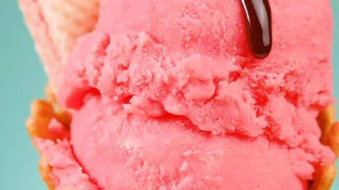 Free Video Stock Strawberry Ice Cream Cone With Chocolate Syrup On A Blue Live Wallpaper - Free Live Wallpaper