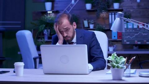 Free Video Stock Stressed Businessman Rubs Eyes While Working On Laptop Live Wallpaper - Free Live Wallpaper