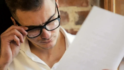 Free Video Stock Stressed Man Removes Glasses And Rubs Forehead Live Wallpaper - Free Live Wallpaper