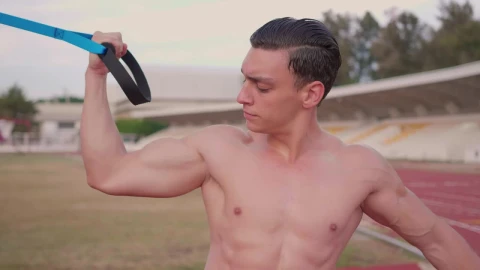 Free Video Stock Strong Man Working Out On A Sports Unit Live Wallpaper - Free Live Wallpaper