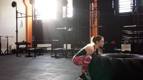 Free Video Stock Strong Woman Lifting A Large Tire  LargeLive Wallpaper - Free Live Wallpaper