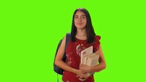 Free Video Stock Student Girl From The Front Smiling On A Green Background Live Wallpaper - Free Live Wallpaper