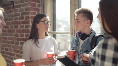 Free Video Stock Students Enjoy A Break In Front Of Sunlit Window Live Wallpaper - Free Live Wallpaper