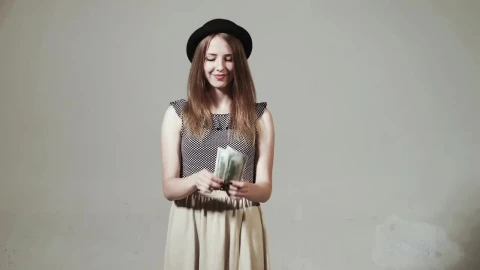 Free Video Stock Stylish Girl Throwing Money Live Wallpaper - Free Live Wallpaper