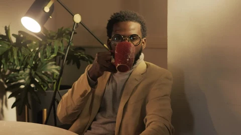 Free Video Stock Stylish Man Drinking A Cup Of Coffee Live Wallpaper - Free Live Wallpaper