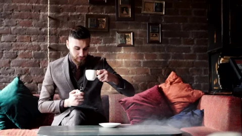 Free Video Stock Stylish Man In Suit Smoking In Coffee Shop Live Wallpaper - Free Live Wallpaper