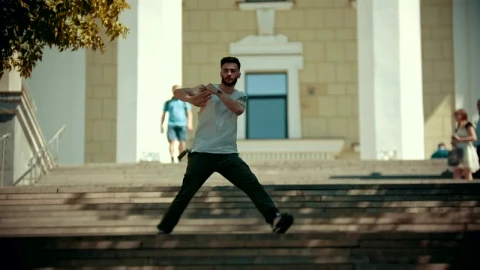 Free Video Stock Stylish Man With Tattoos Dancing On The Stairs Live Wallpaper - Free Live Wallpaper