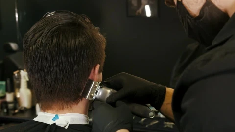 Free Video Stock Stylist Cutting A Boys Hair In A Beautician Live Wallpaper - Free Live Wallpaper