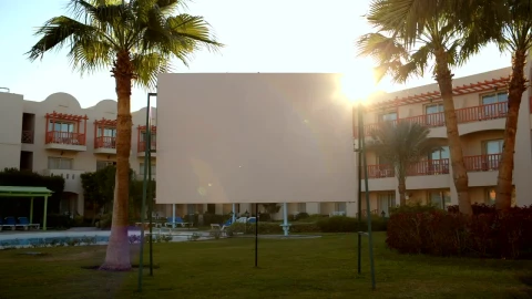 Free Video Stock Sun Flare Behind A Blank Advertisement Live Wallpaper - Free Live Wallpaper