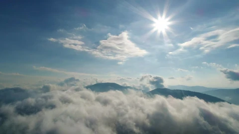 Free Video Stock Sun Flare Over The Cloudy Sky In The Mountains Live Wallpaper - Free Live Wallpaper