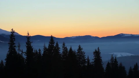 Free Video Stock sunrise in snowy mountains static shot Live Wallpaper - Free Live Wallpaper