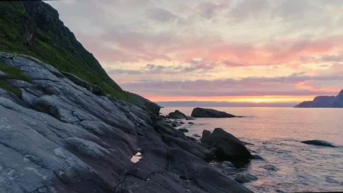 Free Video Stock sunset drone flyover of rocky norway sea coast Live Wallpaper - Free Live Wallpaper
