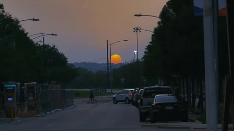 Free Video Stock sunset in the distance walking through the city Live Wallpaper - Free Live Wallpaper