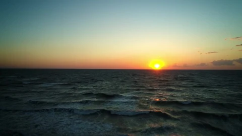 Free Video Stock sunset in the skyline of the beach Live Wallpaper - Free Live Wallpaper