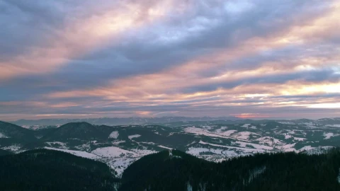 Free Video Stock sunset light illuminating the clouds in the mountains Live Wallpaper - Free Live Wallpaper