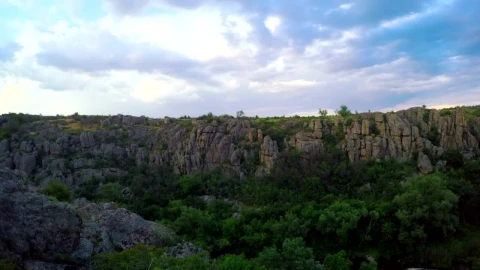 Free Video Stock sunset over a canyon with a rainbow Live Wallpaper - Free Live Wallpaper