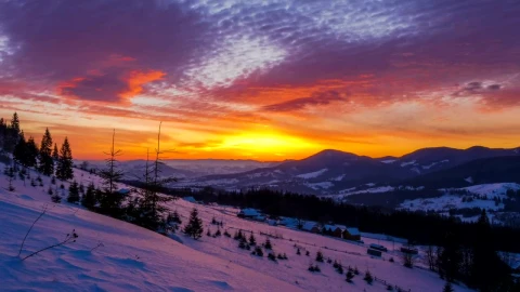 Free Video Stock sunset over a snowy winter mountain Live Wallpaper - Free Live Wallpaper