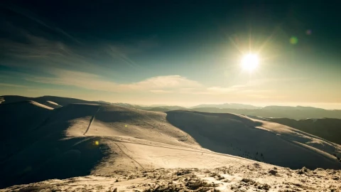 Free Video Stock sunset over snowy mountains timelapse Live Wallpaper - Free Live Wallpaper