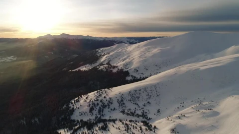 Free Video Stock sunshine illuminating a snowy landscape Live Wallpaper - Free Live Wallpaper