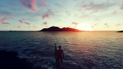 Free Video Stock surfer looking at an island at sunset Live Wallpaper - Free Live Wallpaper
