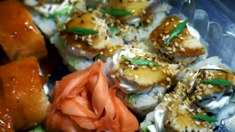 Free Video Stock sushi and chopsticks in plastic container Live Wallpaper - Free Live Wallpaper