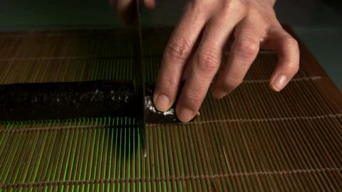Free Video Stock sushi chef preparing a roll of sushi Live Wallpaper - Free Live Wallpaper