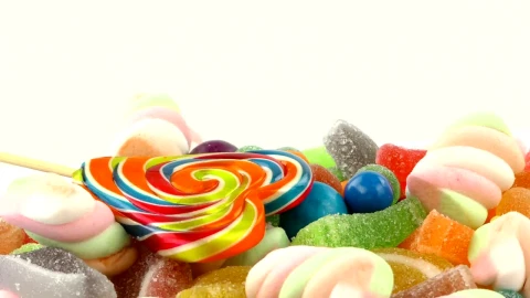 Free Video Stock sweet candies of different types on white background Live Wallpaper - Free Live Wallpaper