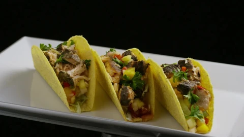 Free Video Stock tacos rotating on a plate on a black background Live Wallpaper - Free Live Wallpaper