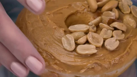 Free Video Stock taking a peanut butter donut from a plate Live Wallpaper - Free Live Wallpaper
