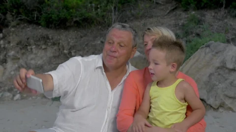 Free Video Stock taking a photo of their grandchild Live Wallpaper - Free Live Wallpaper