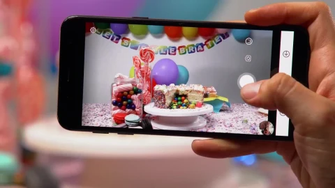 Free Video Stock taking a picture of a birthday table with a smartphone Live Wallpaper - Free Live Wallpaper