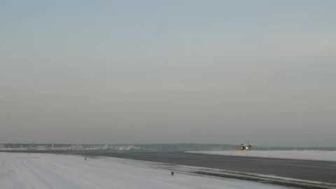 Free Video Stock taking off from a snowy airfield Live Wallpaper - Free Live Wallpaper