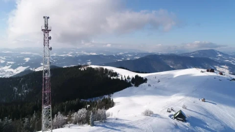Free Video Stock tall telecommunication tower in the snow Live Wallpaper - Free Live Wallpaper