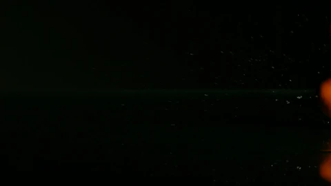 Free Video Stock tangerines bouncing on a black water surface Live Wallpaper - Free Live Wallpaper