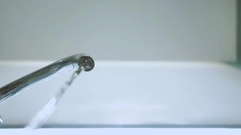 Free Video Stock tap turns on to pour water seen from below Live Wallpaper - Free Live Wallpaper